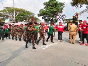 Partisipasi, Ansor Banser Bubulan Ikuti Gerak Jalan Peringatan HUT RI ke-80