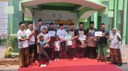 Squad Rusunawa menerima penghargaan juara 1 Lomba Liwetan PCNU Bojonegoro 2026.